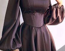 Атласна корсетна сукня з пишною подвійною спідницею та об‘ємними рукавами Атласна корсетна сукня з пишною подвійною спідницею та об‘ємними рукавами | PUSHKA SHOP