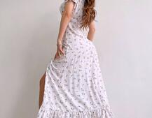 Квіткова сукня з воланами та шнуровкою на ніжці Квіткова сукня з воланами та шнуровкою на ніжці | PUSHKA SHOP