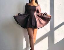 Атласна корсетна сукня з пишною подвійною спідницею та об‘ємними рукавами Атласна корсетна сукня з пишною подвійною спідницею та об‘ємними рукавами | PUSHKA SHOP