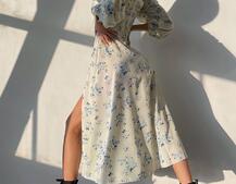 Квіткова сукня-міді з розрізом та об'ємними рукавами Квіткова сукня-міді з розрізом та об'ємними рукавами | PUSHKA SHOP