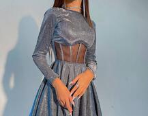 Приталена блискуча сукня з корсетною вставкою та пишною спідницею-сонцем Приталена блискуча сукня з корсетною вставкою та пишною спідницею-сонцем | PUSHKA SHOP